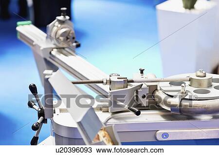 Stock Image - Pipe bending machine. Fotosearch