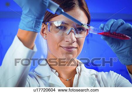 Pipetting sample View Large Photo Image Picture - Pipetting sample. Fotosearch