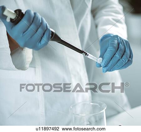Pipetting sample View Large Photo Image Stock Image - Pipetting sample. Fotosearch