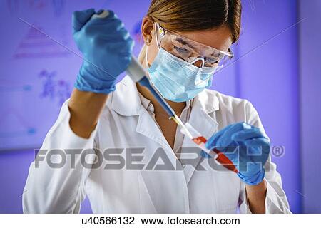 Pipetting sample View Large Photo Image Stock Image - Pipetting sample. Fotosearch