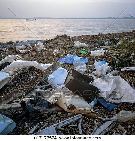 Picture - Plastic rubbish on shore. Fotosearch