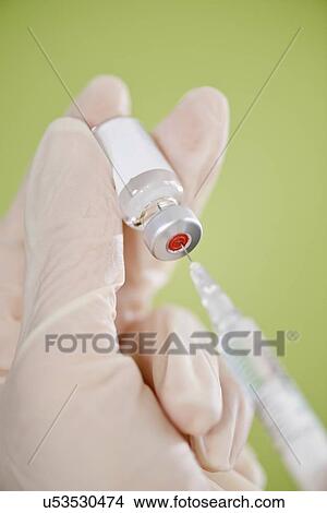 Preparing vaccine View Large Photo Image Picture - Preparing vaccine. Fotosearch
