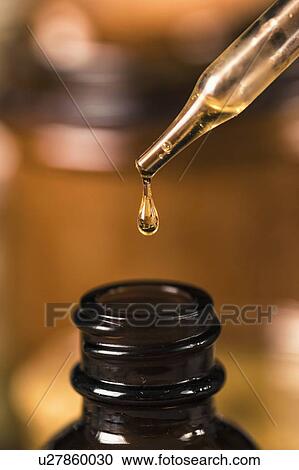 Propolis drop close up View Large Photo Image Stock Image - Propolis drop close up. Fotosearch