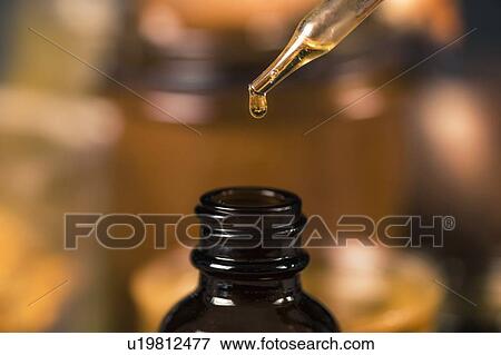 Stock Photo - Propolis drop close up. Fotosearch