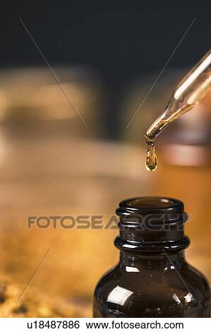 Stock Photograph - Propolis drop close up. Fotosearch