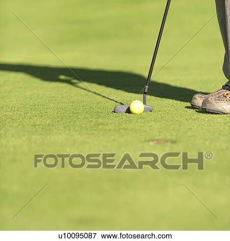 Stock Photo - Putting shot. Fotosearch