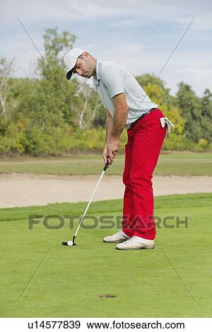 Stock Photo - Putting. Fotosearch