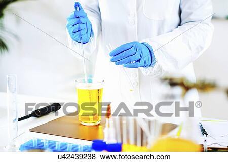 Stock Photo - Quality control of beer. Fotosearch