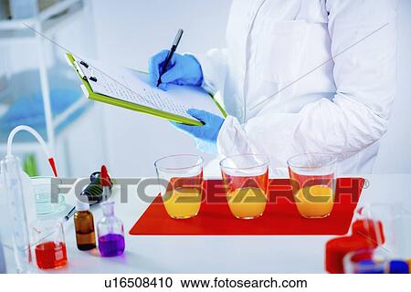 Quality control of juice View Large Photo Image Stock Image - Quality control of juice. Fotosearch