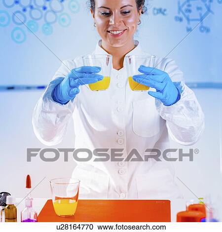 Stock Image - Quality control of juice. Fotosearch