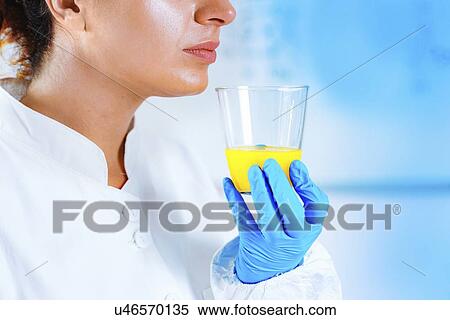 Stock Photography - Quality control of juice. Fotosearch