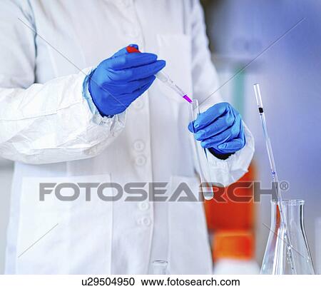 Stock Image - Quality control of milk. Fotosearch