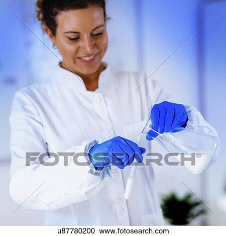 Stock Image - Quality control of milk. Fotosearch