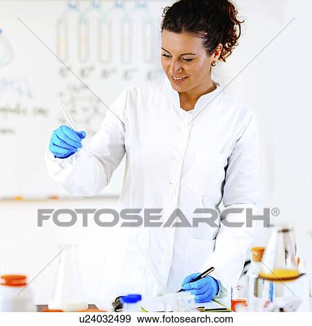 Stock Photo - Quality control of milk. Fotosearch