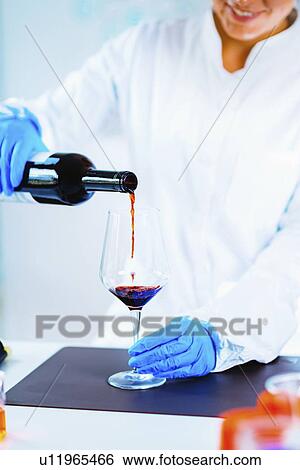 Stock Photograph - Quality control of wine. Fotosearch