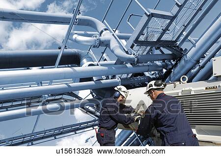 Refinery workers View Large Photo Image Stock Photo - Refinery workers. Fotosearch