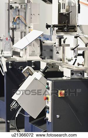 Stock Image - Reinforcement screwdriver machine. Fotosearch