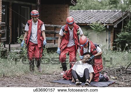 Rescue workers at the disaster scene View Large Photo Image Stock Photo - Rescue workers at the disaster scene. Fotosearch