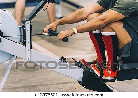 Rowing machine workout View Large Photo Image Stock Image - Rowing machine workout. Fotosearch
