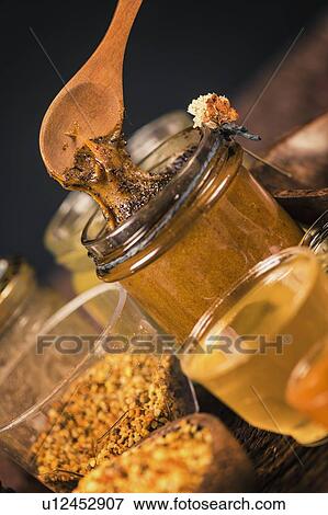 Royal jelly honey with propolis and pollen View Large Photo Image Stock Photo - Royal jelly honey with propolis and pollen. Fotosearch