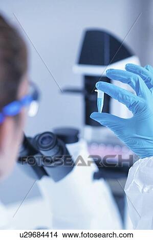 Picture - Science researcher in lab. Fotosearch