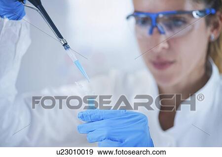 Stock Photo - Science researcher in lab. Fotosearch