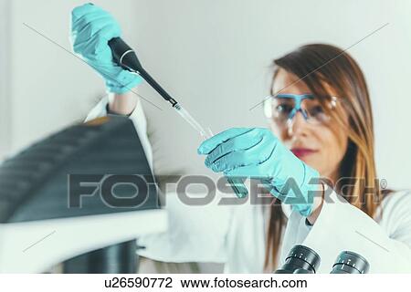 Stock Image - Scientific research. Fotosearch