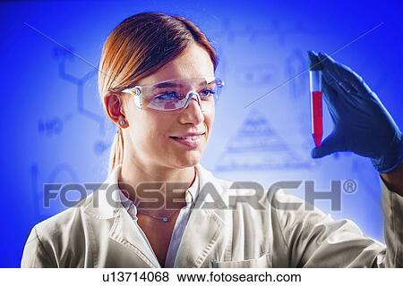 Scientist examining sample View Large Photo Image Stock Photo - Scientist examining sample. Fotosearch