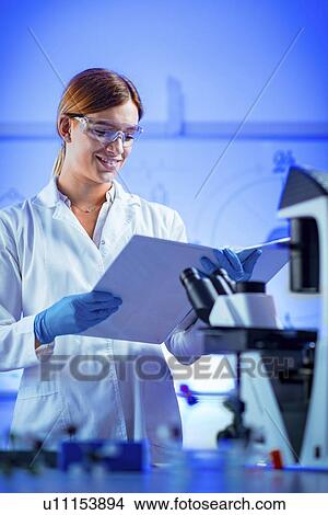 Picture - Scientist in laboratory. Fotosearch