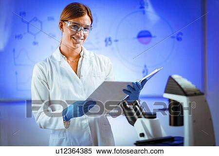 Stock Photography - Scientist in laboratory. Fotosearch