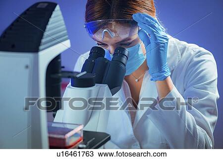 Scientist using microscope View Large Photo Image Stock Image - Scientist using microscope. Fotosearch
