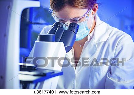 Scientist using microscope View Large Photo Image Stock Image - Scientist using microscope. Fotosearch
