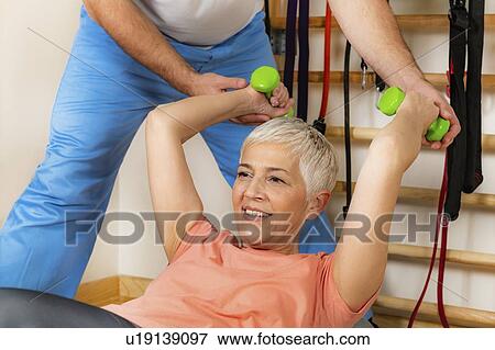 Senior woman exercising on pilates ball View Large Photo Image Stock Photo - Senior woman exercising on pilates ball. Fotosearch