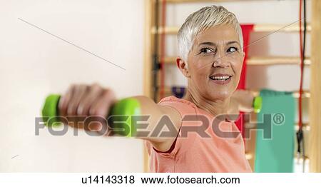 Senior woman exercising View Large Photo Image Stock Photo - Senior woman exercising. Fotosearch