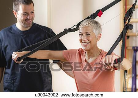Senior woman with personal trainer View Large Photo Image Stock Image - Senior woman with personal trainer. Fotosearch