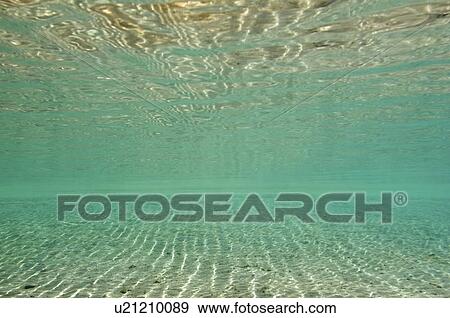 Stock Photo - Shallow water background. Fotosearch