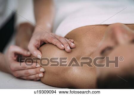 Picture - Shoulder massage. Fotosearch
