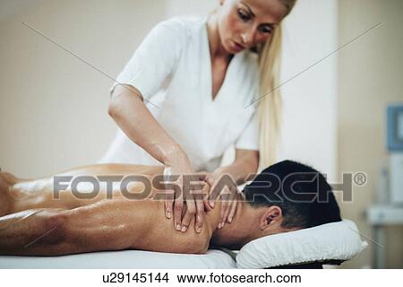 Picture - Shoulder massage. Fotosearch