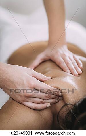 Stock Image - Shoulder massage. Fotosearch