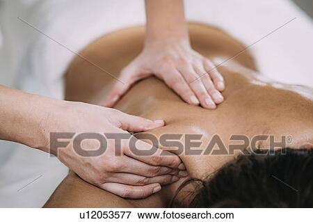 Stock Photo - Shoulder massage. Fotosearch
