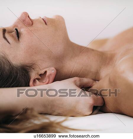 Shoulder massage View Large Photo Image Stock Photo - Shoulder massage. Fotosearch