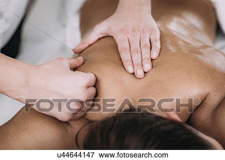 Stock Photo - Shoulder massage. Fotosearch