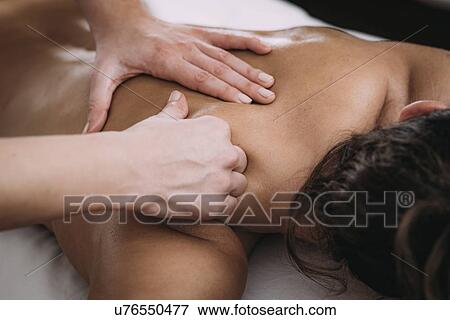 Shoulder massage View Large Photo Image Stock Photo - Shoulder massage. Fotosearch