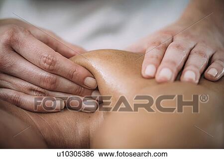Shoulder massage View Large Photo Image Stock Photograph - Shoulder massage. Fotosearch