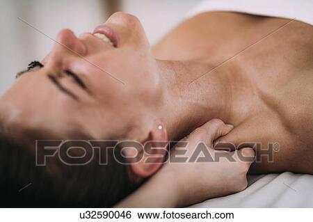 Shoulder massage View Large Photo Image Stock Photograph - Shoulder massage. Fotosearch