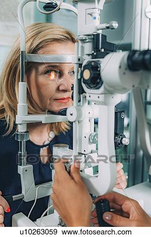 Stock Photo - Slit lamp eye examination. Fotosearch