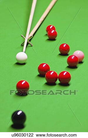 Stock Image - Snooker cue on rest. Fotosearch