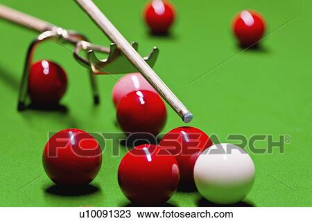 Stock Image - Snooker cue on spider rest. Fotosearch