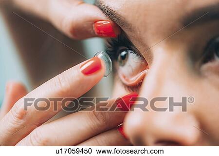 Soft contact lens insertion View Large Photo Image Stock Image - Soft contact lens insertion. Fotosearch