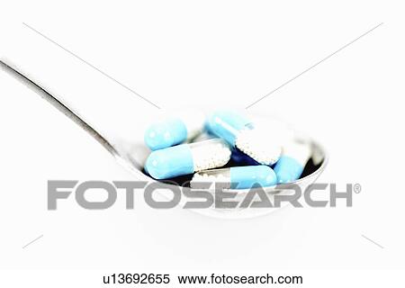 Spoonful of capsules View Large Photo Image Stock Photography - Spoonful of capsules. Fotosearch